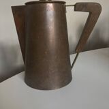 Modernist Italian pitcher design from the 1960s in patinated wood and metal.