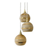 Suspension triple vintage glass globes in frosted yellow and gold.