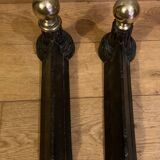 Pair of Napoleon III andirons from the 19th century in cast iron and brass