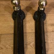 Pair of Napoleon III andirons from the 19th century in cast iron and brass