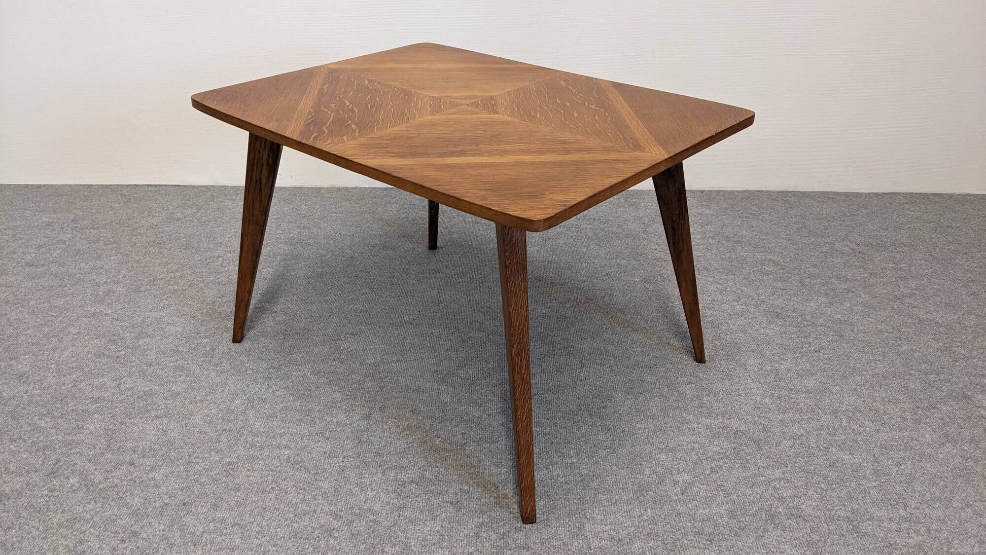 Modernist coffee or side table in oak marquetry, France 1960.