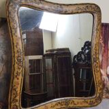 Important rectangular Venetian mirror with a richly painted wooden frame.