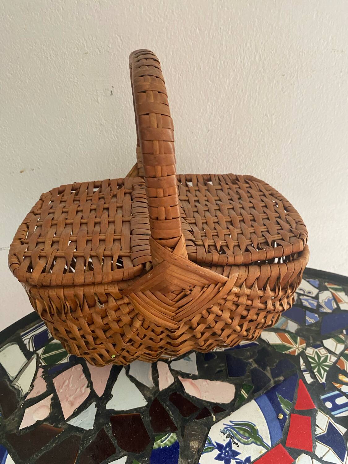 Brown woven vintage wicker basket with 2 lids.