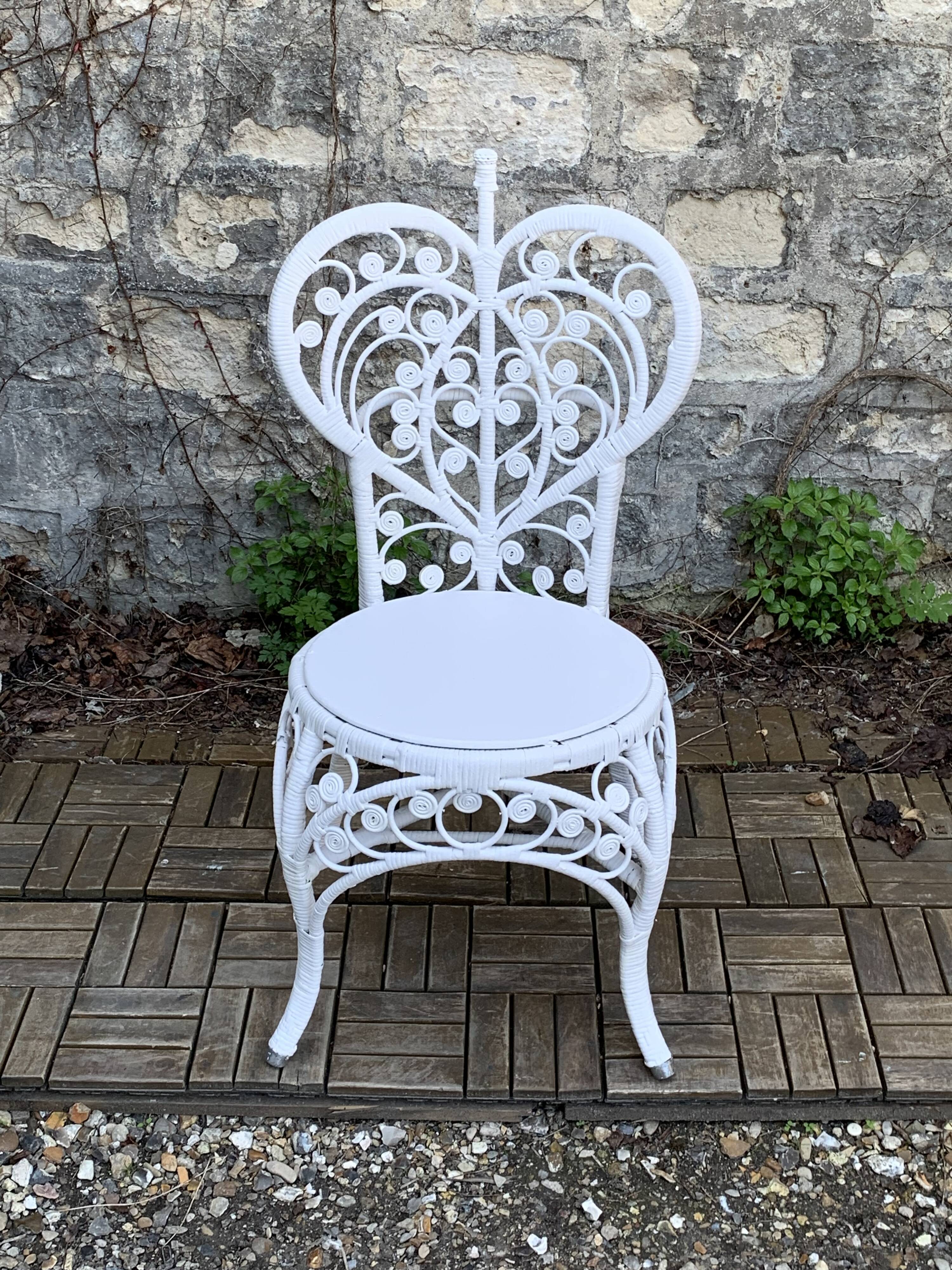 Peacock armchair and chair in white rattan, 1970