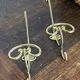Pair of brass hooks