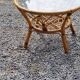 Round rattan coffee table with glass top from the 70s