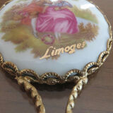 Handheld mirror in porcelain and gilded metal 50s 60s