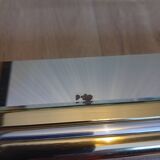 Glass and golden brass coffee table