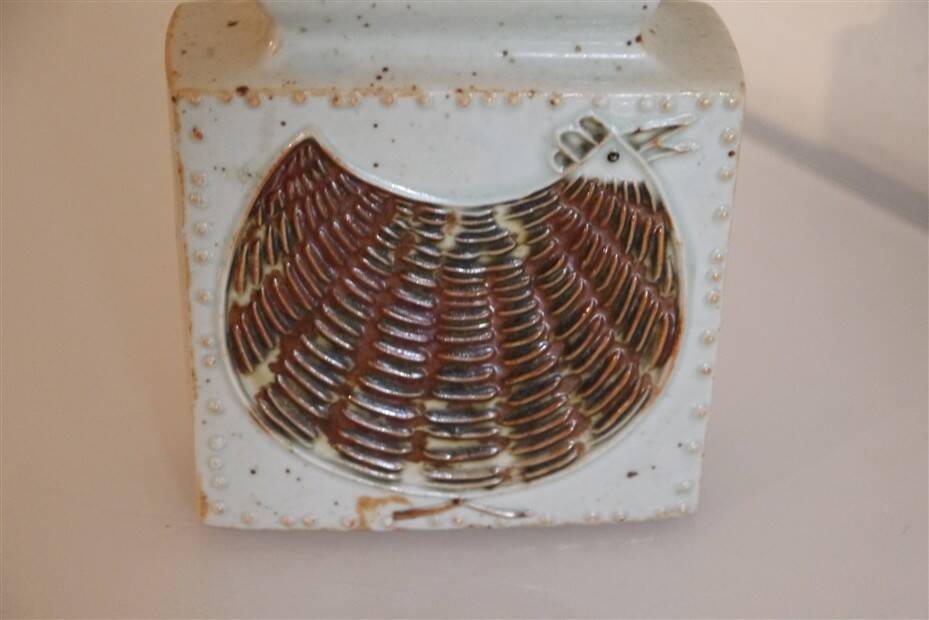 Scandinavian ceramic vase with stylised bird decoration.