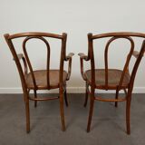Pair of curved wooden bistro armchairs