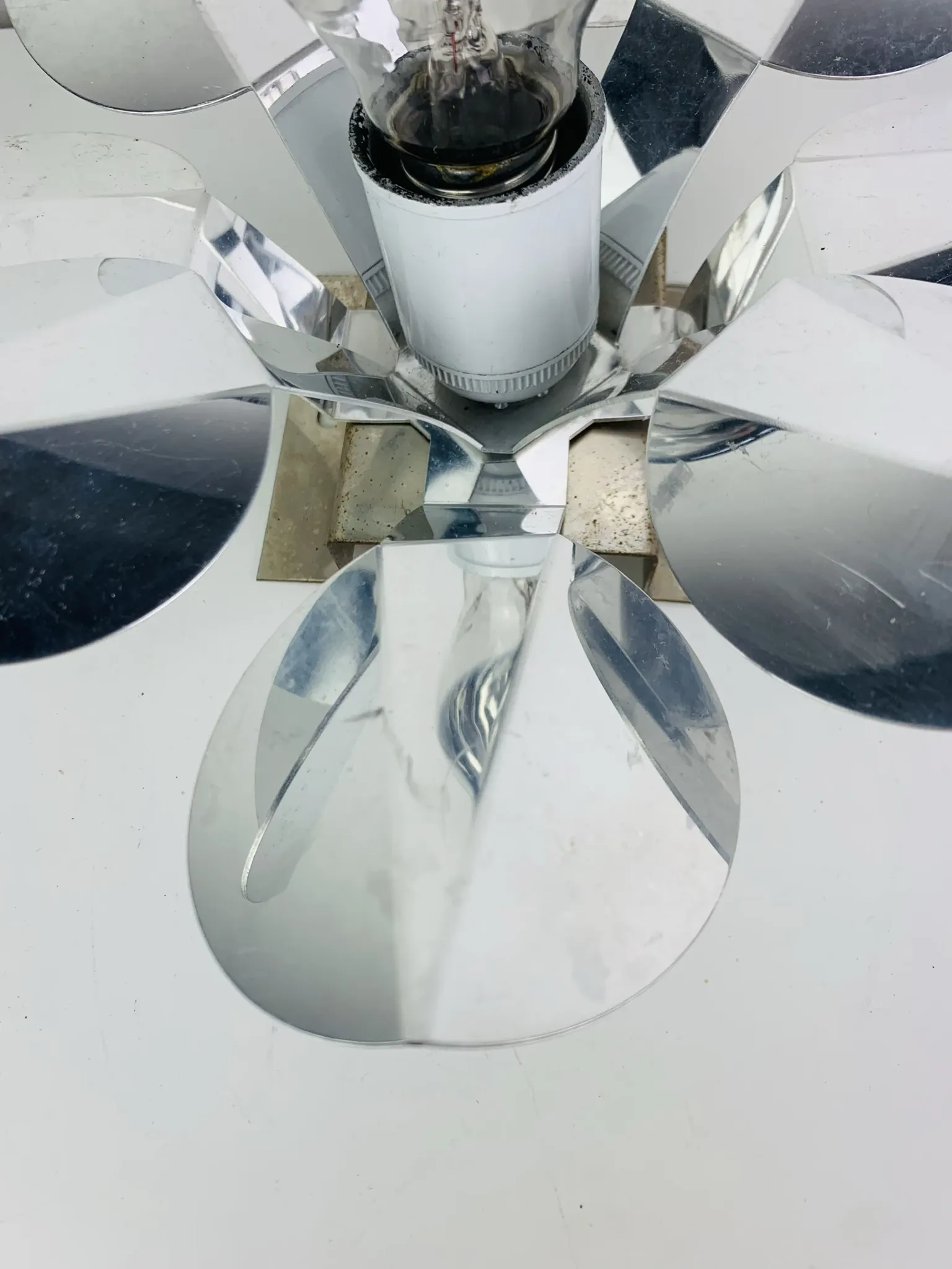 Space Age chrome flower wall light from the 1960s.
