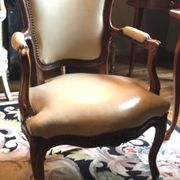 Louis XV period armchair in natural wood with convertible back carved with flowers