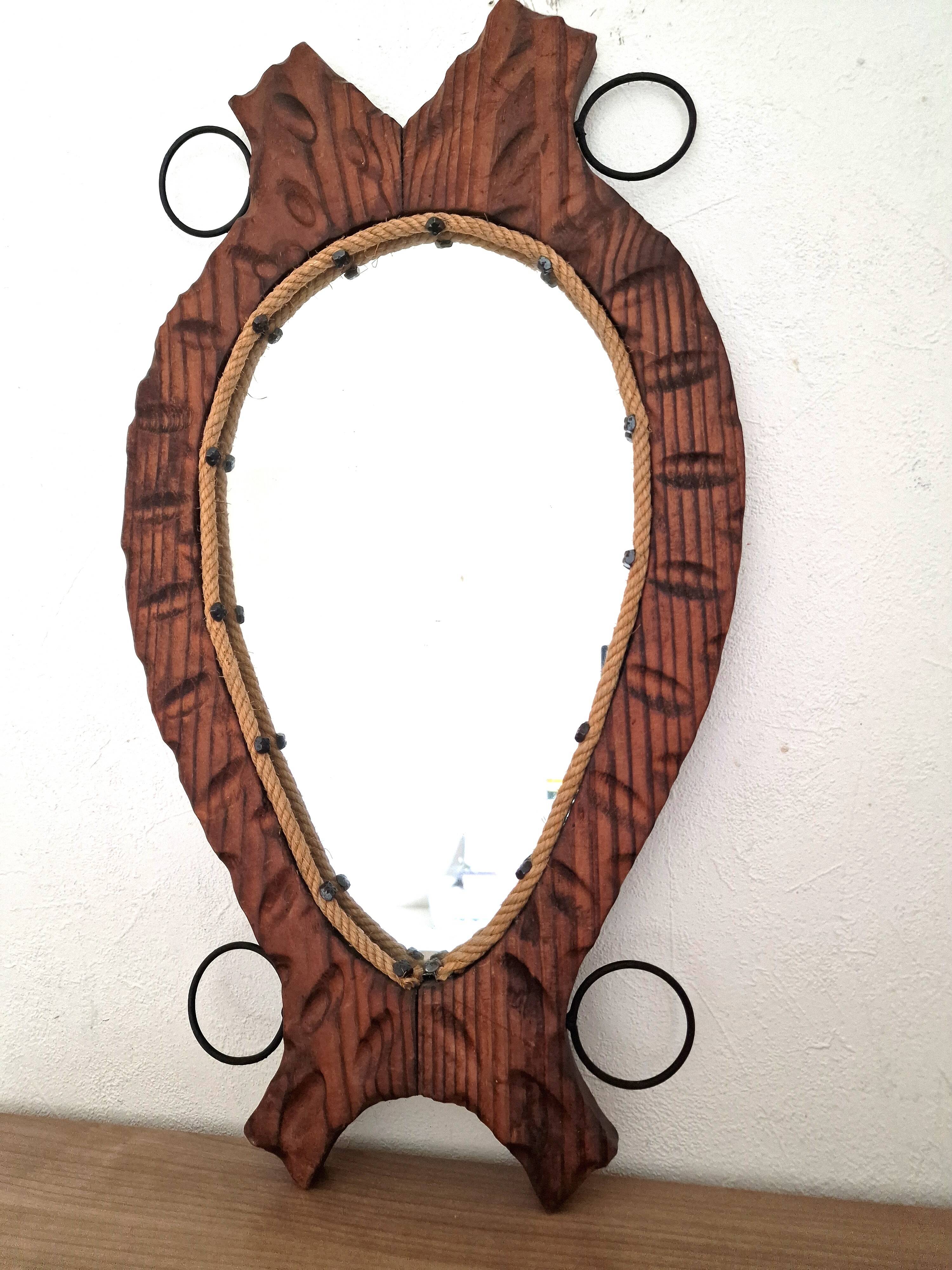 Brutalist mirror in wood and rope, free form.