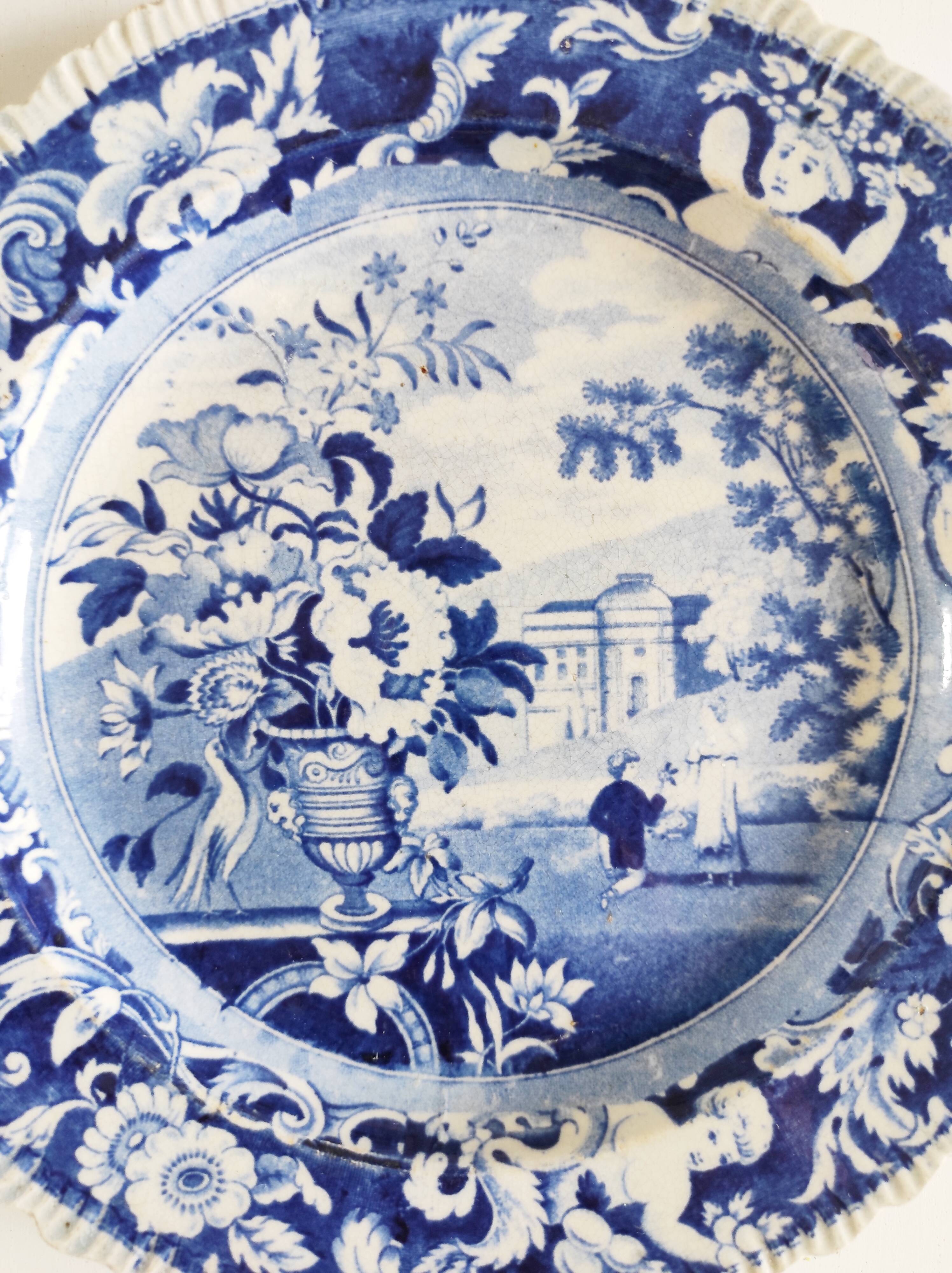 Five 19th century Calais earthenware plates with a romantic gallant couple decor