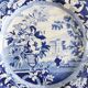 Five 19th century Calais earthenware plates with a romantic gallant couple decor