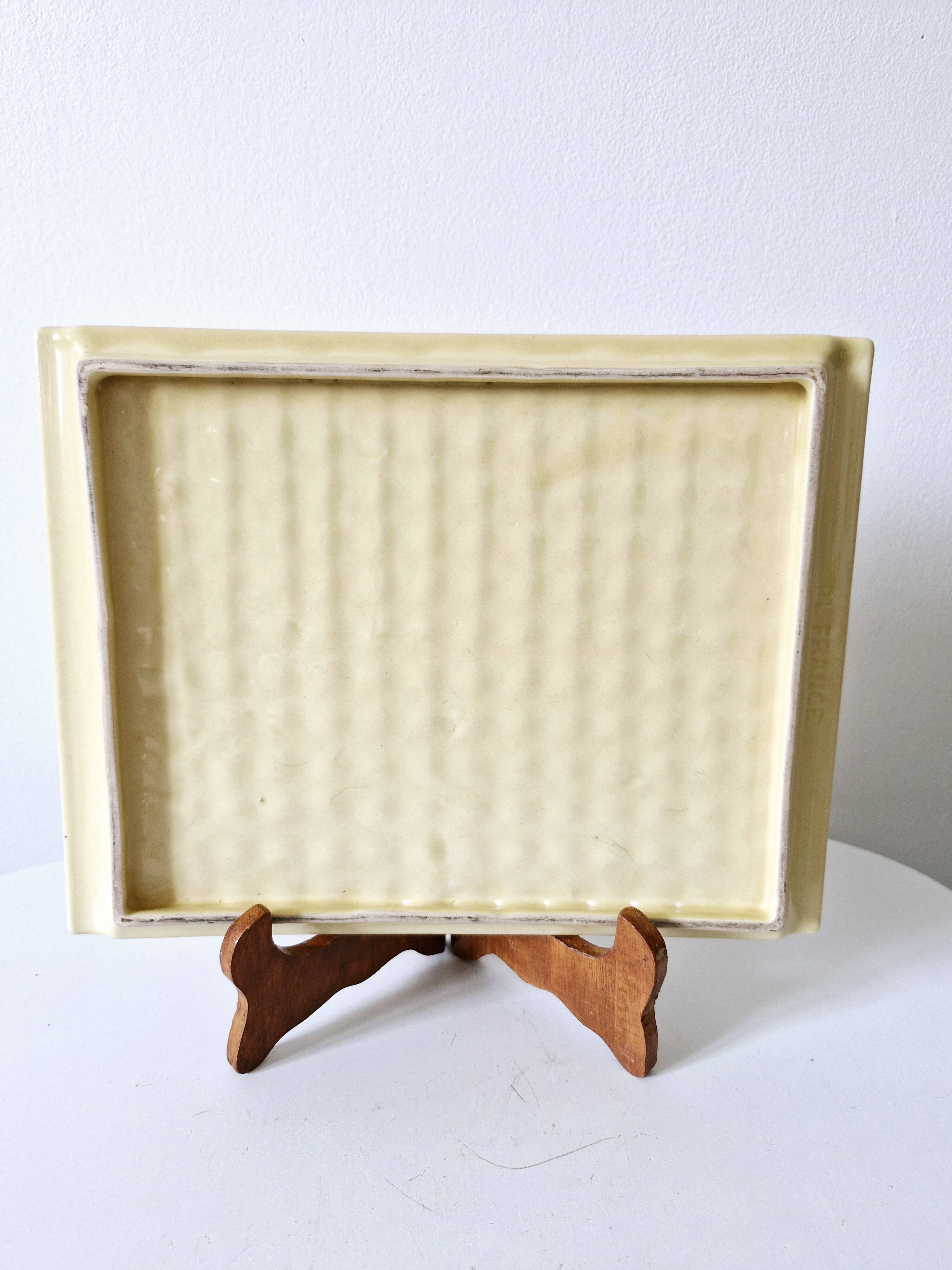 Plateau Poët Laval 1950s yellow straw ceramic with woven patterns.