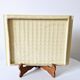 Plateau Poët Laval 1950s yellow straw ceramic with woven patterns.