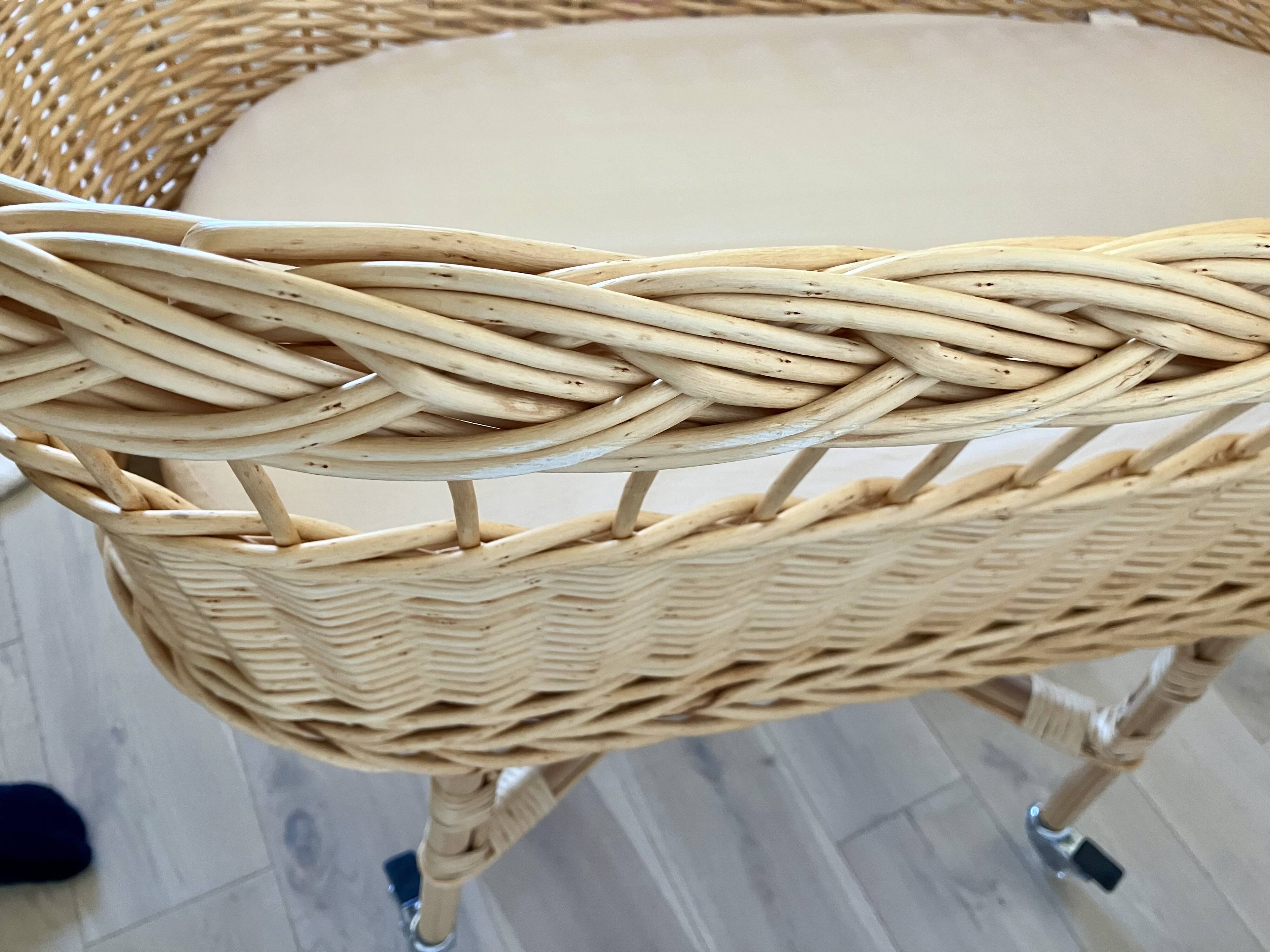 Hand-woven rattan cradle