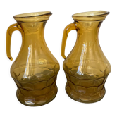 Pair of smoked glass pitchers