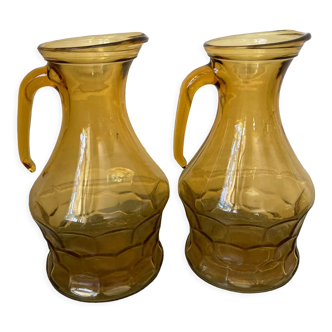 Pair of smoked glass pitchers
