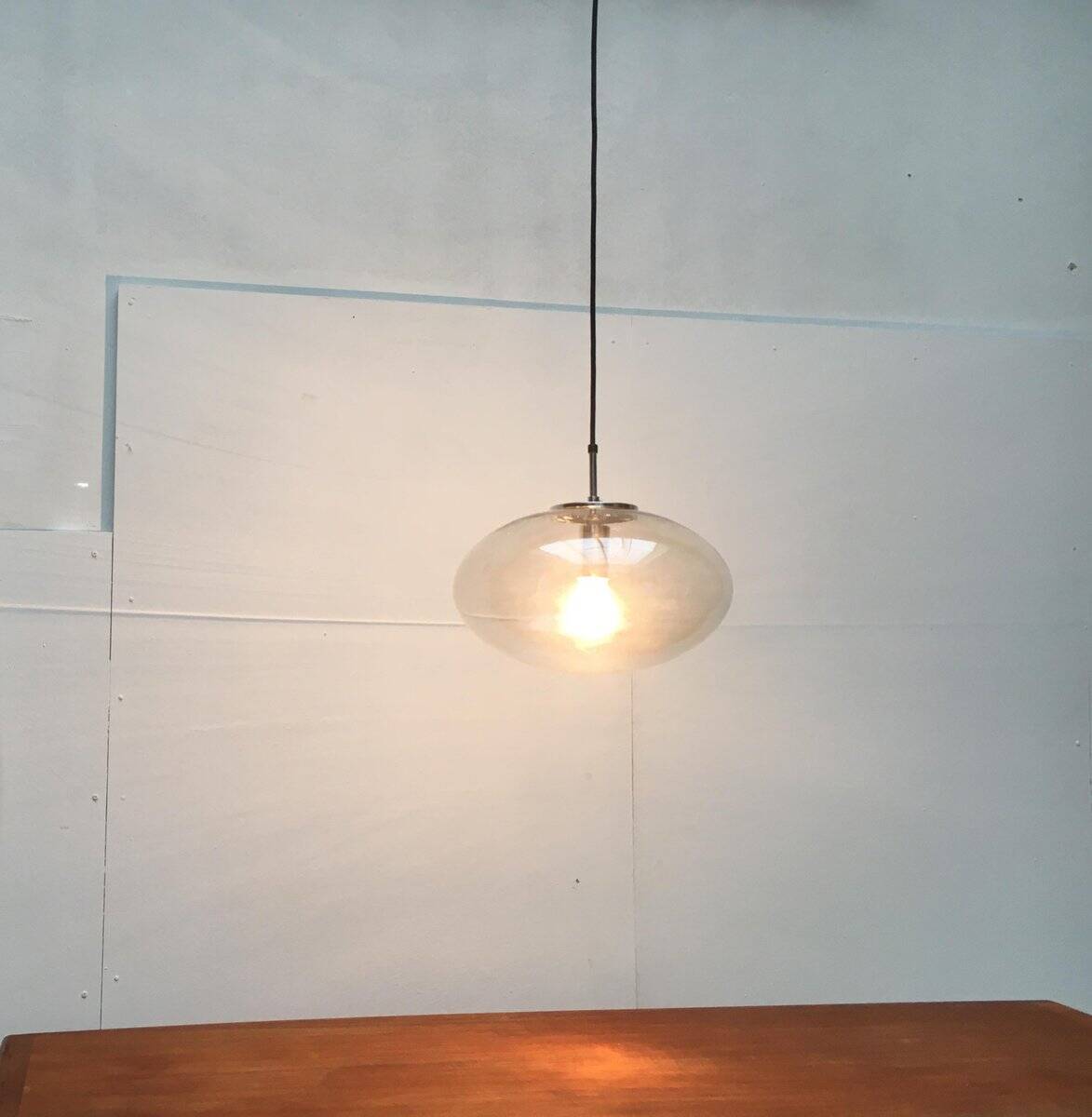 Suspended UFO-shaped glass luminaires in mid-century German Space Age style, set of 3.