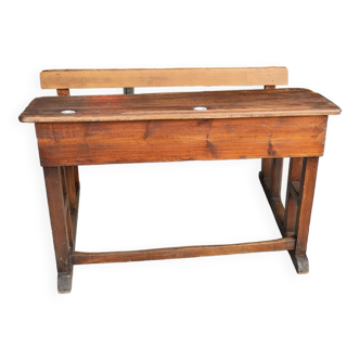 Old two-seater oak school desk with its original inkwells