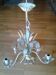 Vintage metal chandelier with floral decoration