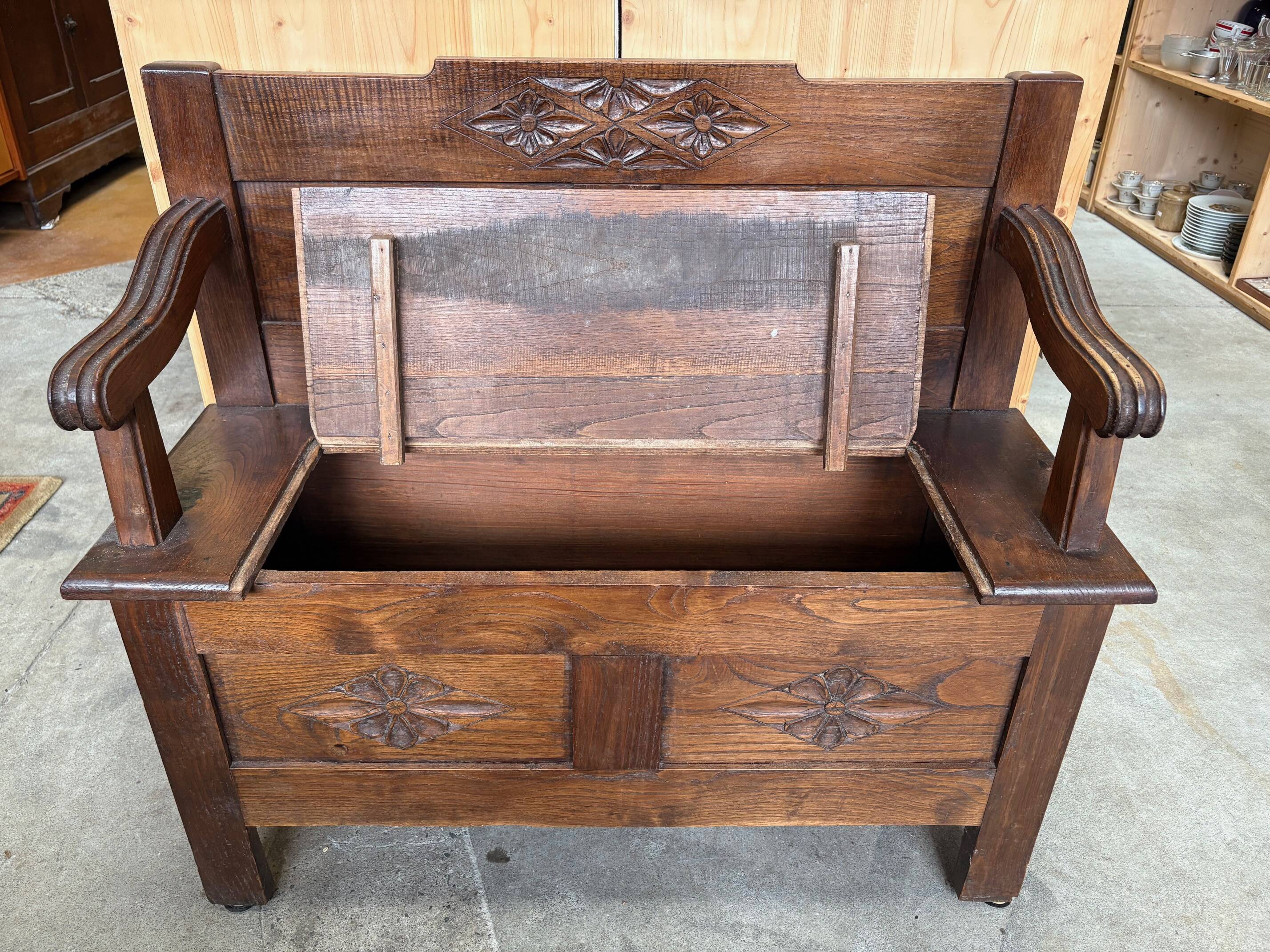 Antique carved wooden storage bench