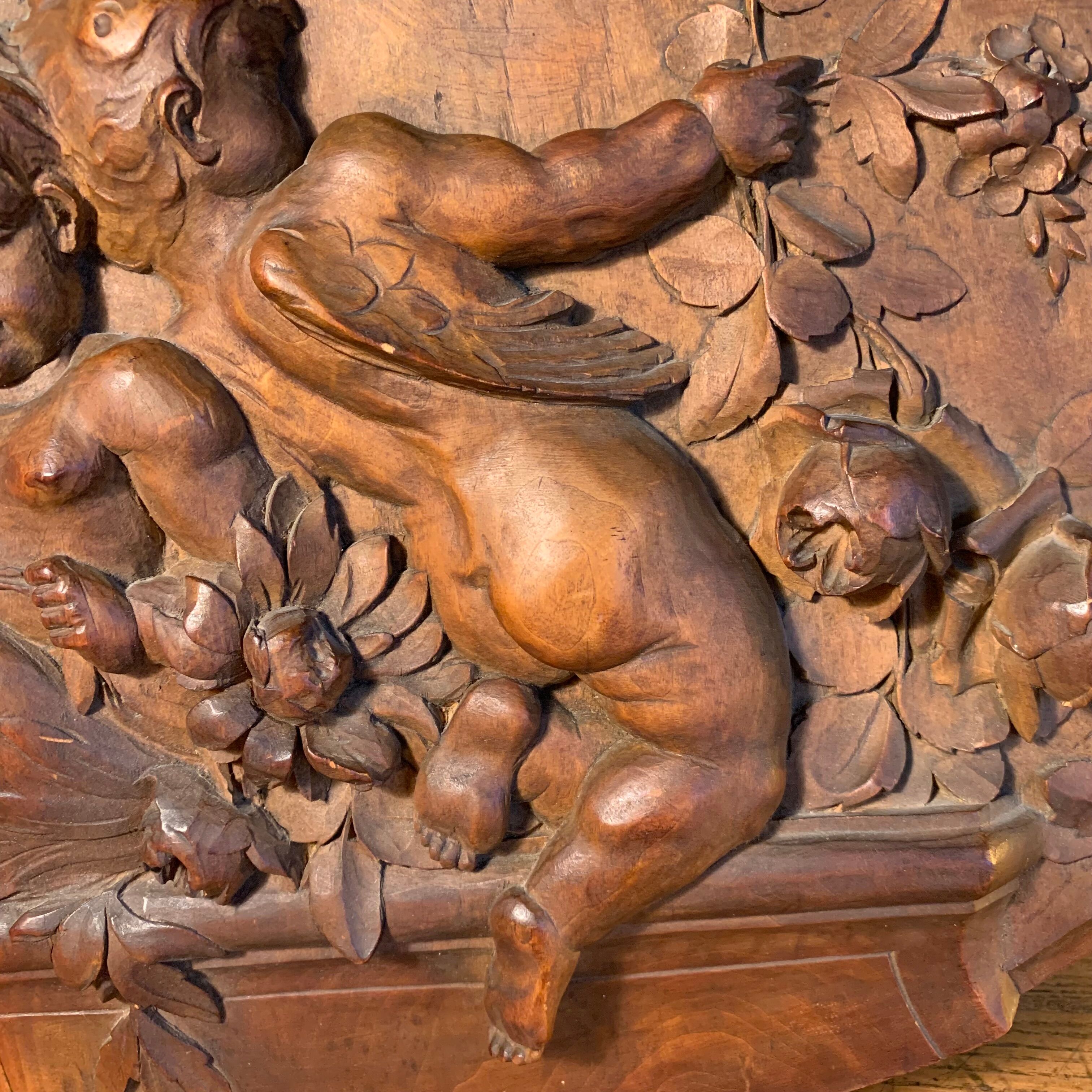Carved wooden bas-relief