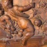 Bas relief en bois sculpté