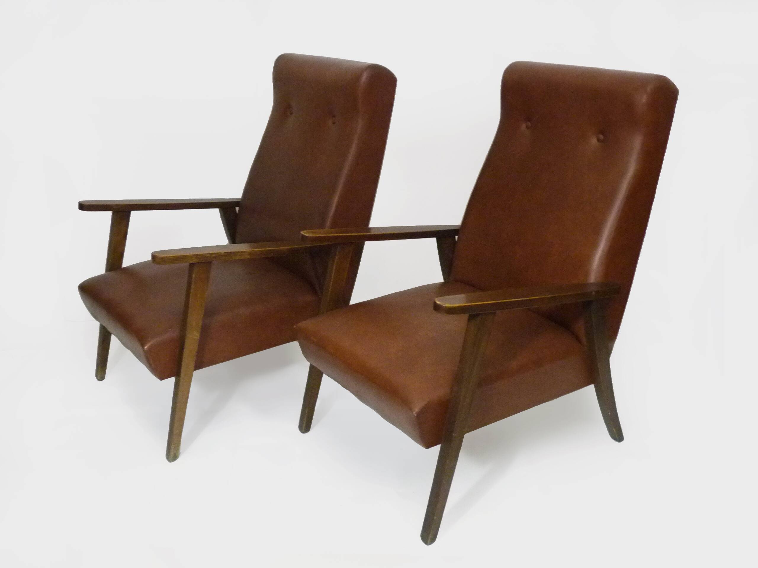 Pair of Scandinavian armchairs in brown leatherette and wood from the 50s and 60s