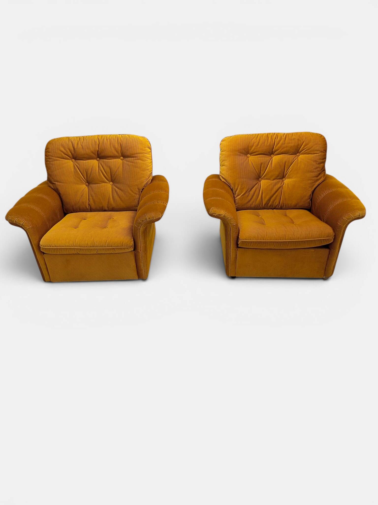 Vintage lounge chair on wheels in golden mustard corduroy 70s