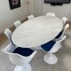 Oval Knoll Saarinen table in Carrara marble + 8 original Tulip chairs