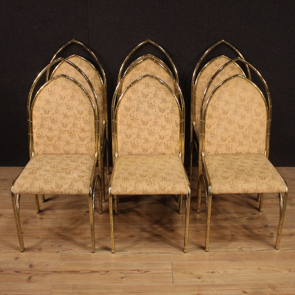 Six Italian design chairs in golden metal