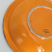 Dish dominant orange and green Saint Clement France