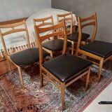 5 Scandinavian style chairs, wood and black faux leather.