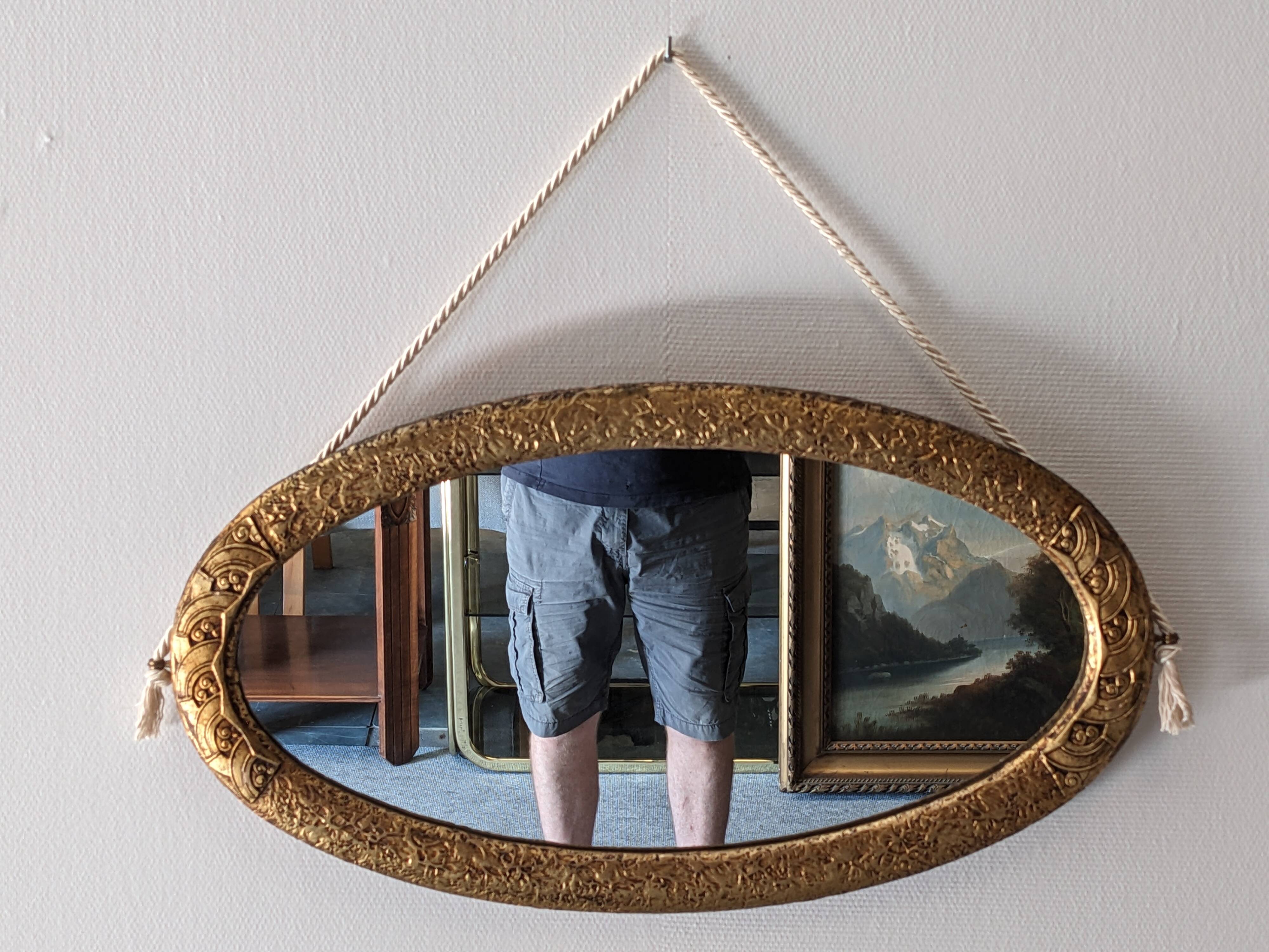 Art Deco gilded wood oval mirror circa 1920