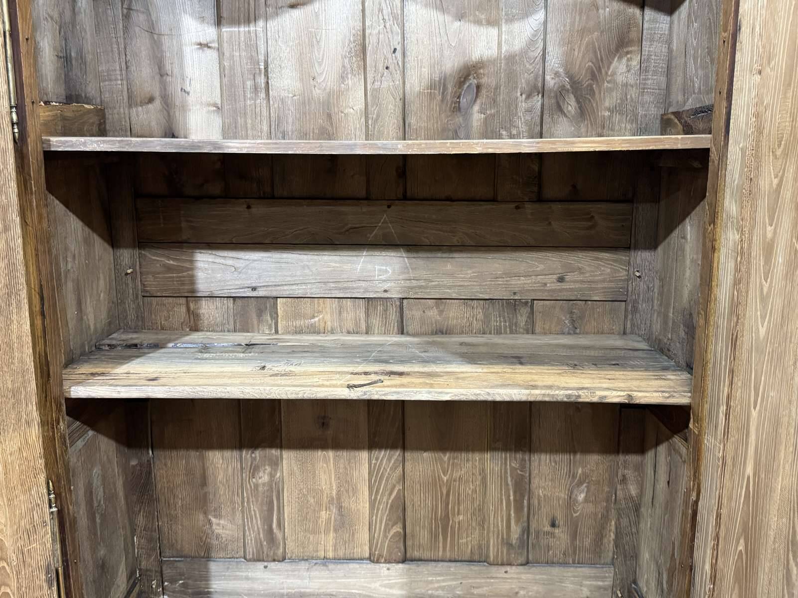 19th-century country wardrobe in blonde chestnut.
