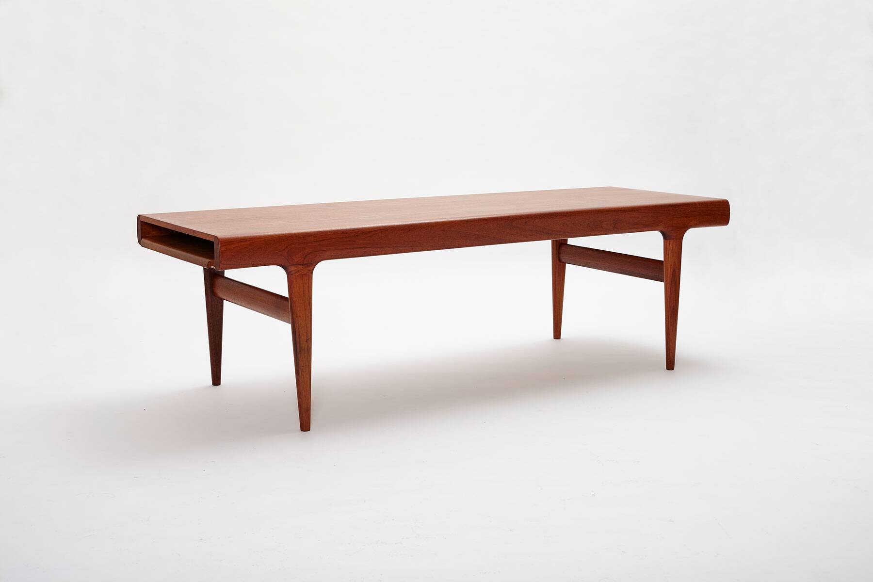 Extendable coffee table designed by Johannes Andersen for Uldum Møbelfabrik, Denmark, 1960s.