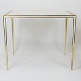 A pair of brass and white mirror tables from Vereinigte Werkstätten, Germany, 1970s.