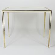 A pair of brass and white mirror tables from Vereinigte Werkstätten, Germany, 1970s.
