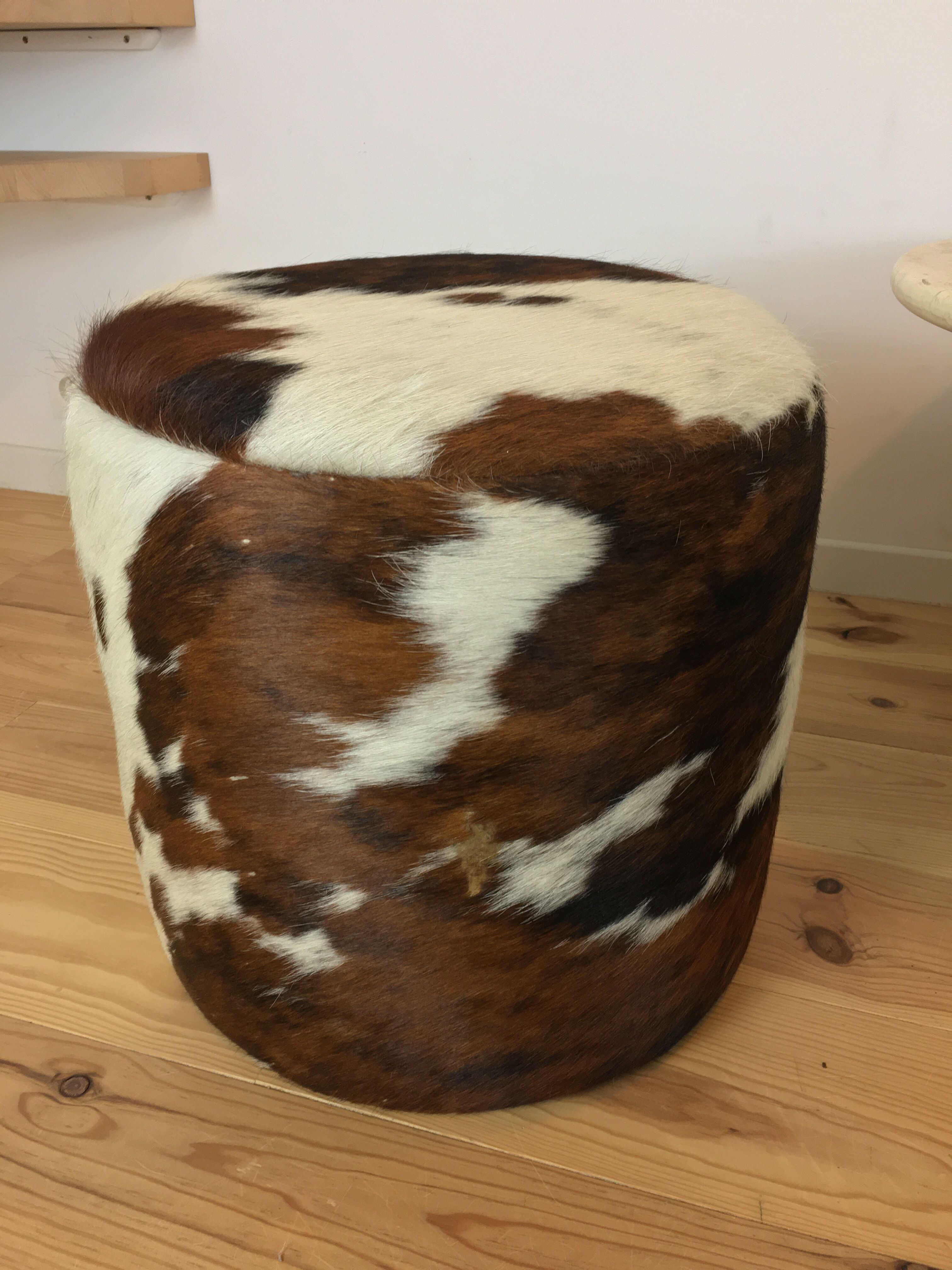 Pouf and cow cushion, leather