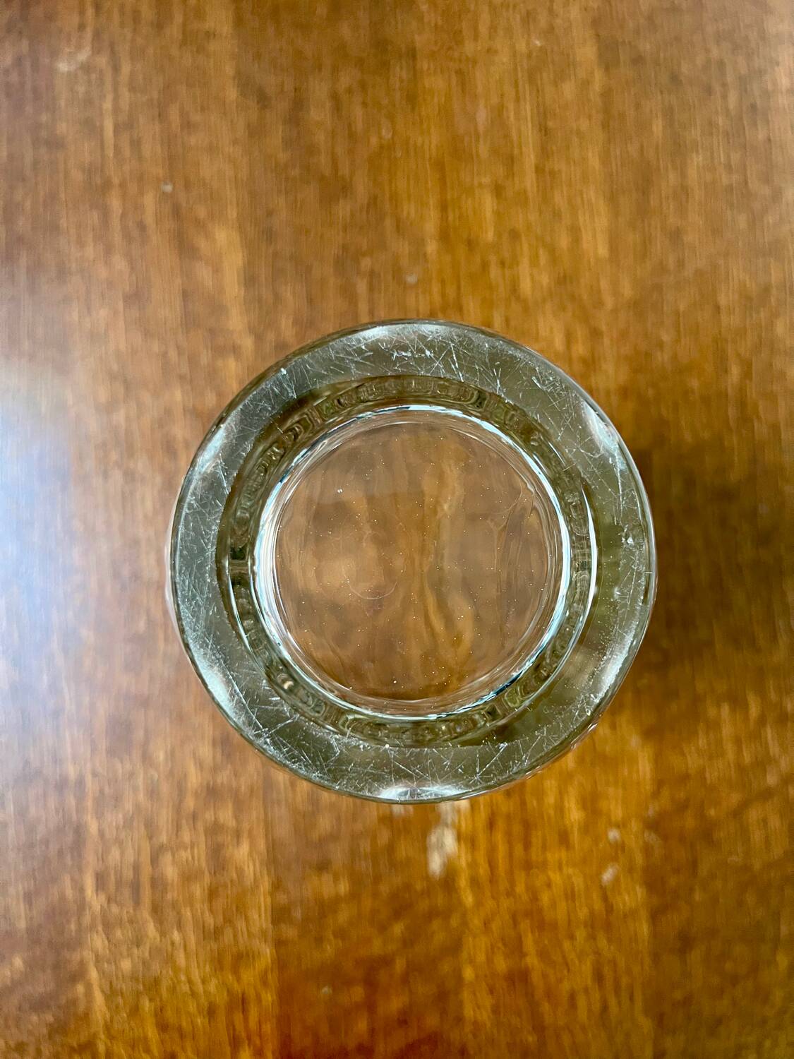 Molded glass vase with sculpted decoration