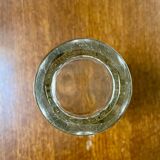 Molded glass vase with sculpted decoration