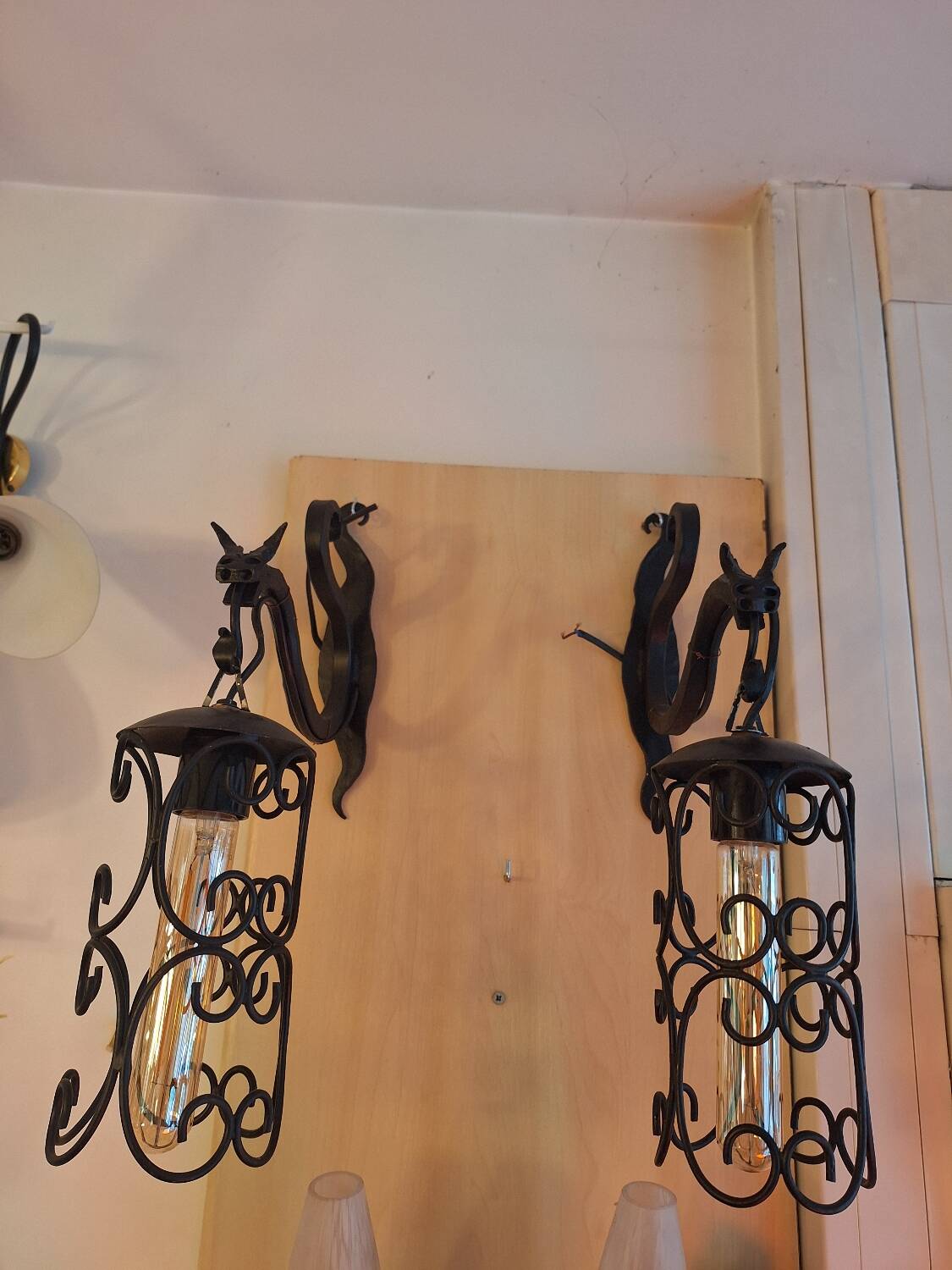 pair of wrought iron animal wall lights