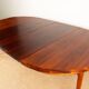 Danish extendable dining table in rosewood by Kai Lyngfeldt Larsen.