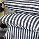 Berber cushion black lines and white medium