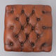 English country house style padded leather ottoman