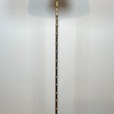 Pair of parquet floor lamps in faux-bamboo style in bronze and brass by Jacques Adnet.