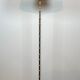 Pair of parquet floor lamps in faux-bamboo style in bronze and brass by Jacques Adnet.